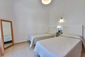Postel nebo postele na pokoji v ubytování Villa Bellavista Calpe
