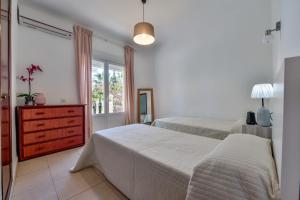 Postel nebo postele na pokoji v ubytování Villa Bellavista Calpe