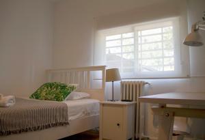 Łóżko lub łóżka w pokoju w obiekcie Real Beds Madrid