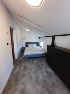 Postel nebo postele na pokoji v ubytování Apart Wilhelmina 75m2