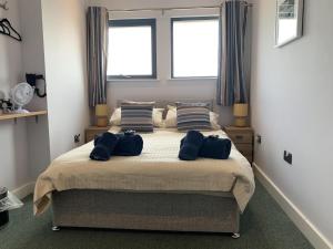 Postelja oz. postelje v sobi nastanitve No 1 Ocean Cabins - Saundersfoot Harbour - Saundersfoot