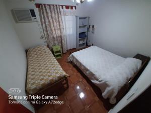 Giường trong phòng chung tại Quinta el quebracho