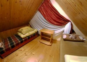 En eller flere senge i et værelse på Zakochani w Jaworkach