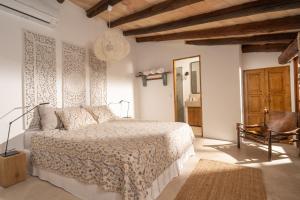 A bed or beds in a room at CA'N QUINN Még 23 kép