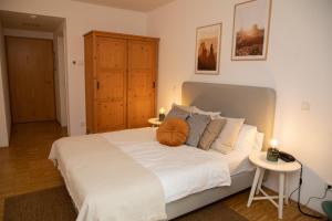 Postel nebo postele na pokoji v ubytování Hotel Hofgut Imsbach Lapointe