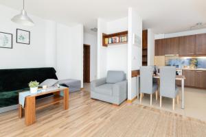 Posezení v ubytování Villa 4 Pory Roku by Noclegi Renters