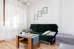 Posezení v ubytování Villa 4 Pory Roku by Noclegi Renters