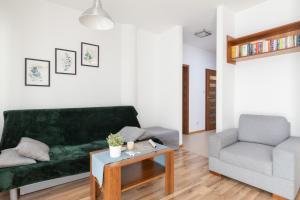 Posezení v ubytování Villa 4 Pory Roku by Noclegi Renters
