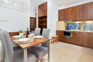 Kuchyň nebo kuchyňský kout v ubytování Villa 4 Pory Roku by Noclegi Renters