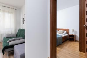 Postel nebo postele na pokoji v ubytování Villa 4 Pory Roku by Noclegi Renters