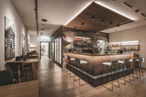 Ο χώρος του lounge ή του μπαρ στο Boutique Hotel und Chalets Bergwiesenglück