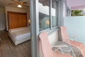 Posteľ alebo postele v izbe v ubytovaní Hotel Ideal + 37 fotografií