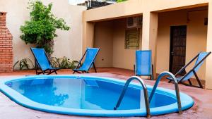 Bazén v ubytování Residencial Los Pinos nebo v jeho okolí