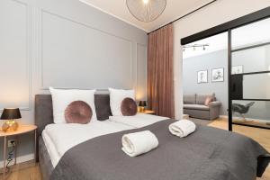 Posteľ alebo postele v izbe v ubytovaní Browar Gdański Free Parking by Noclegi Renters