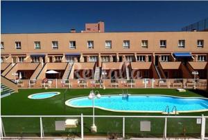 Bazén v ubytovaní Corralejo vista mar alebo v jeho blízkosti