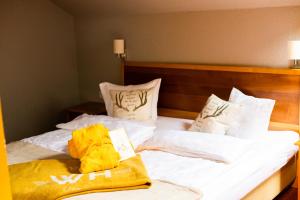 Letto o letti in una camera di Walliserhof
