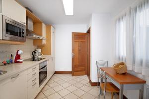 A kitchen or kitchenette at Malvasia 22