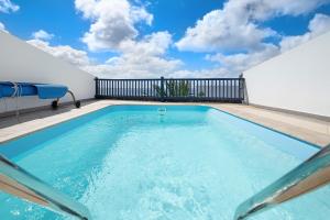The swimming pool at or close to Malvasia 22