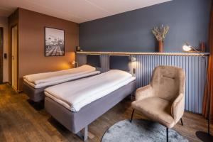 Ліжко або ліжка в номері Pier 5 Hotel