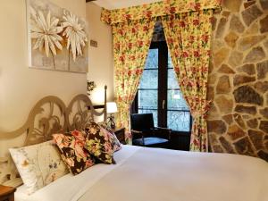 Cama o camas de una habitación en Akla La Casa Del Puente
