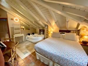 Cama o camas de una habitación en Akla La Casa Del Puente