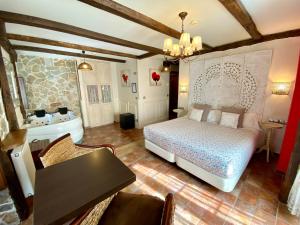 Cama o camas de una habitación en Akla La Casa Del Puente