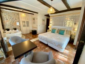 Cama o camas de una habitación en Akla La Casa Del Puente