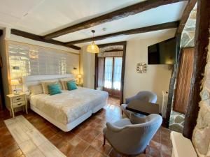 Cama o camas de una habitación en Akla La Casa Del Puente