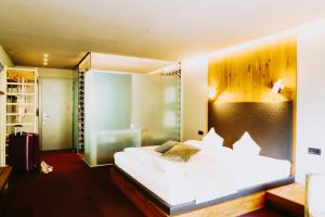 Letto o letti in una camera di Walliserhof