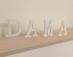 a shelf with the word art on it at Residenza DaMa in Lucera