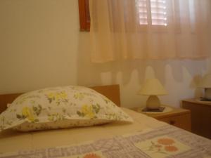 Posteľ alebo postele v izbe v ubytovaní Apartment View Razanac