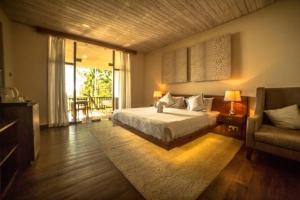מיטה או מיטות בחדר ב-NIKARA Luxury Beach House