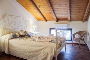 Postel nebo postele na pokoji v ubytování Le Coccole + 37 fotografií