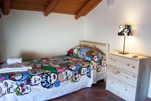 Postel nebo postele na pokoji v ubytování Le Coccole