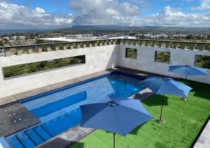 Bazén v ubytování Hotel MX más san miguel de allende nebo v jeho okolí