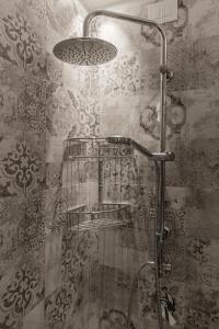a shower with a glass door in a bathroom at EUROPA Hotel in Vasto