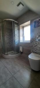 Łazienka w obiekcie Santoczno Santohaus Dom Wakacyjny nr 7