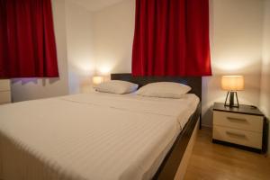 Postel nebo postele na pokoji v ubytování Apartmani Di-Ana