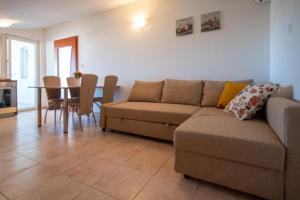 Posezení v ubytování Apartmani Di-Ana