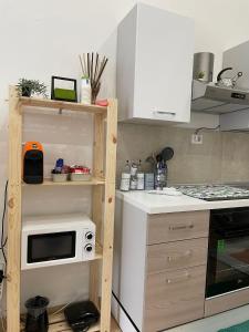 Kuchyňa alebo kuchynka v ubytovaní La Casita