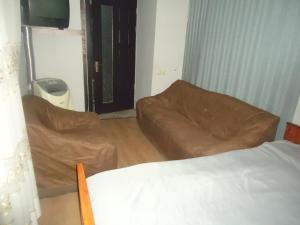 Postel nebo postele na pokoji v ubytování Guest House R&T