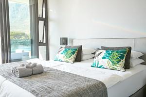 Giường trong phòng chung tại Bayview Boutique Guesthouse