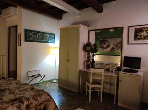 A bed or beds in a room at D'Elite Room & Breakfast