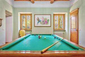 a billiard room with a pool table at Villa Maria in Monte San Savino