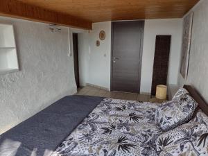 Postel nebo postele na pokoji v ubytování VOTRE HORIZON