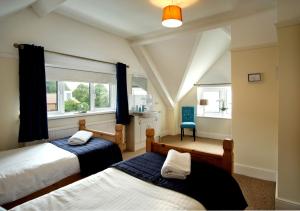 Ένα ή περισσότερα κρεβάτια σε δωμάτιο στο Beachside Suites