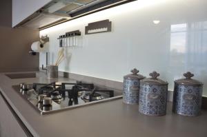 Kuchyň nebo kuchyňský kout v ubytování Orchidea apartments