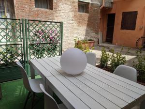 A balcony or terrace at D'Elite Room & Breakfast