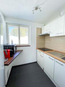 Kuchyň nebo kuchyňský kout v ubytování Säntisecho - in der Natur zu Hause
