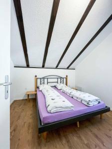 Postel nebo postele na pokoji v ubytování Säntisecho - in der Natur zu Hause